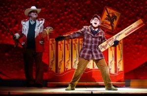 Johnny Rabe belts it out while Dan Lauria looks on in this fantasy sequence from A Christmas Story, the Musical.